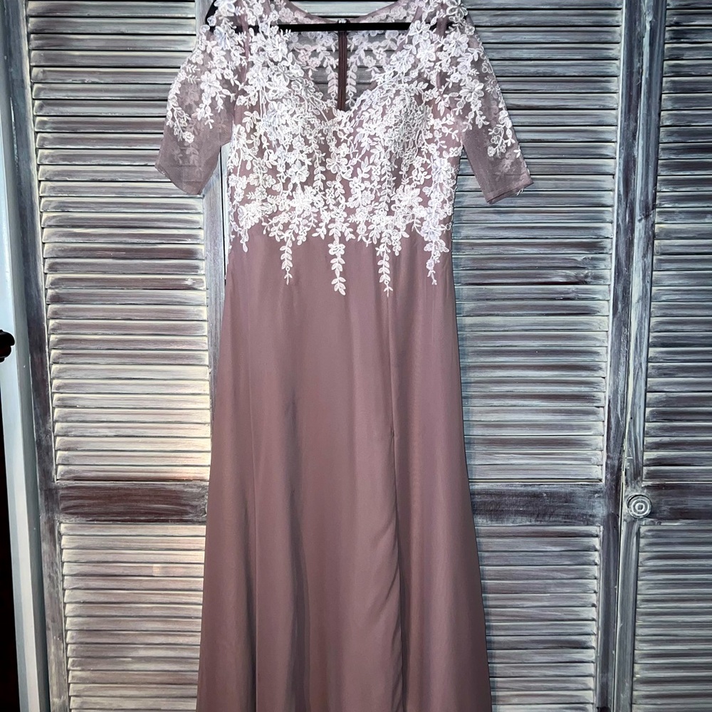 Formal dress worn once for an hour for a vow renewal.